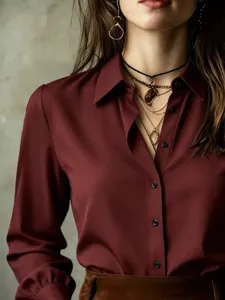 Burgundy long sleeve button down shirt collar detail professional apparel product view closeup