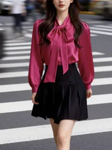 Elegant long sleeve tie neck blouse detail, soft drape fabric for comfortable commuting wear.