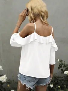 White off-the-shoulder ruffle camisole blouse detail, casual resort style summer top.