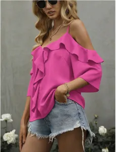 Detail view of the pink off-the-shoulder ruffle cami top showcasing its stylish design and loose fit.
