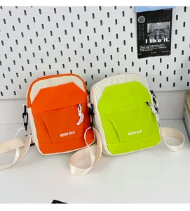 Lightweight color blocking crossbody mobile phone bag casual sports shoulder bag for outdoor travel.