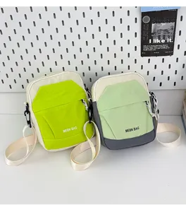 Casual colorblock crossbody mobile phone bag, lightweight outdoor travel shoulder bag details.