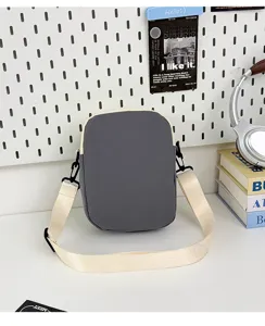 Lightweight phone crossbody bag, casual color-block shoulder bag for daily travel and outdoor use.