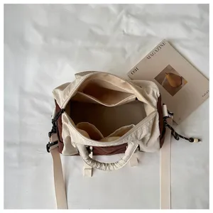 Borsa a tracolla in tela a contrasto stile coreano con scomparti multipli per le donne.