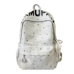 Korean ins style star print backpack, casual large capacity school bag for students.