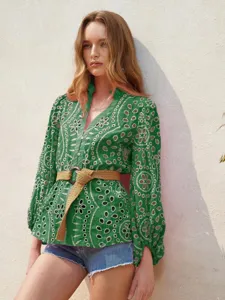 Green embroidered V-neck long sleeve blouse with lantern sleeves and stylish hollow-out design.