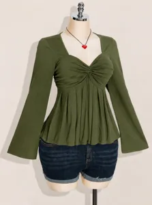 Green ruched square neck long sleeve top detail view, elegant fitted casual apparel.