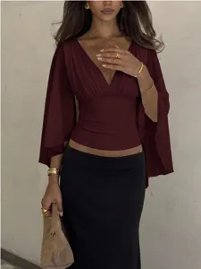 Europäische französische tief V Fledermausärmel Bluse Slim Fit kurze einfarbige Top Detail