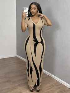 Detailed view of the European and American style abstract print short sleeve slim maxi dress.