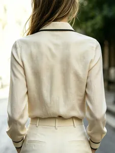 Französisches Hemd mit Kontrastkante für Damen, Reverskragen und langem Ärmel, elegant.