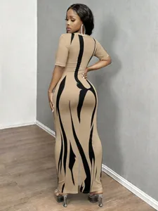 Detail view of the stylish abstract flame print bodycon long dress with short sleeves.