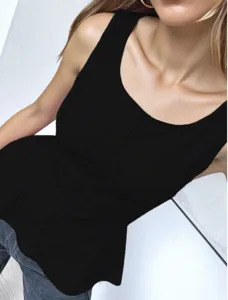 Close-up detail of the elegant black sleeveless scoop neck top showcasing its slim fit style.