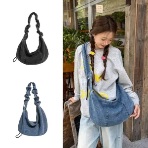 Casual denim dumpling shoulder bag, large capacity Korean style commuting hobo bag for women.