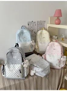 Sac à dos d'école à carreaux mignon pour femme, cartable en toile style japonais avec pendentif.