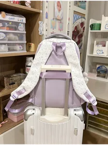 Korean sweet star dopamine ita bag backpack, detailed view showing back straps and trolley sleeve.