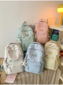 Niedlicher pastellfarbener Schulrucksack mit süßen Cartoon-Hund-Mustern für den Alltag.