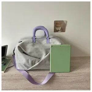 Expandable large capacity travel duffel bag, casual shoulder handbag for short business trips.
