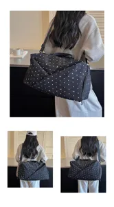 Large capacity travel duffel bag with cute polka dot and bow print, perfect for gym and trips.