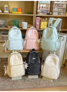 Star print school backpack for girls, lightweight casual daypack with large capacity for students.