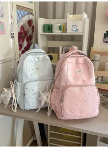 Lightweight star pattern student schoolbag, large capacity casual backpack for daily use.