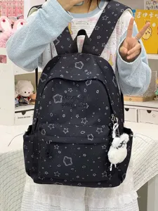 Vista detallada de una mochila negra con bonitos patrones de estrellas y galletas para uso diario.
