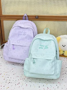 Mochila escolar informal de color caramelo dulce para estudiantes, diseño ligero gran capacidad.