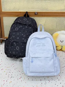 Vista detallada de mochila escolar color caramelo dulce con estampado de estrellas para alumnos.