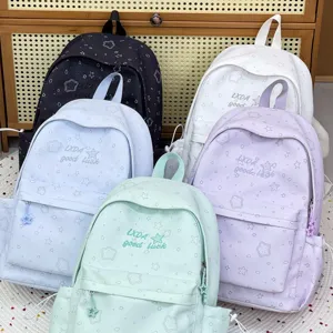 Mochila escolar de colores dulces, bolso grande y elegante para uso diario juvenil.