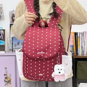 Sac à dos en nylon tendance pour femme avec motif étoiles et pendentif, cartable étudiant.