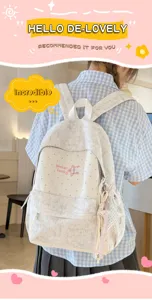 Sac à dos d'école en toile légère avec des pois mignons, grande capacité et beau design.