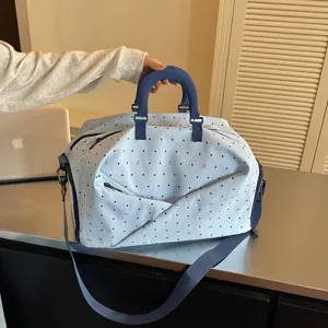 Large capacity travel duffel bag with cute pattern, portable handbag for short trips.