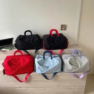 Large capacity travel duffel bag with expandable design, portable fitness gym bag for short trips.