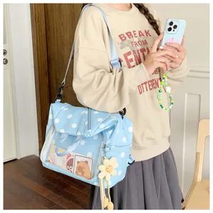 Borsa zaino Ita a pois azzurro chiaro con finestra trasparente, borsa a tracolla casual ed elegante.