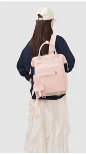 Zaino per pannolini rosa grande capacità viaggio borsa casual per donne e madri elegante uso.
