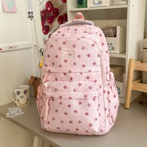 Sac à dos d'école motif étoiles chiné rose pour étudiants voyage quotidien et loisirs.