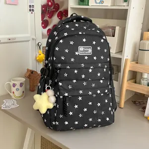 Sac à dos scolaire décontracté style coréen avec motif étoiles pour usage quotidien.