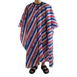Professional salon haircutting cape with classic red blue white stripes and barber shop print.