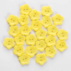 Yellow flower shaped two hole buttons for DIY hair accessories sewing and crafts details