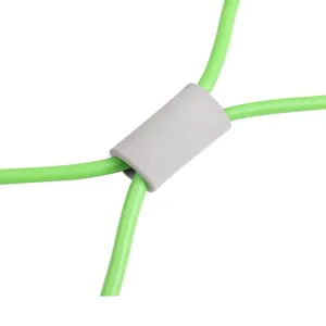 Close-up detail of the grey foam handle and green resistance band for back training workouts.