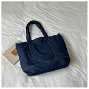Vue détaillée du grand sac cabas en toile denim, sac à épaule décontracté et polyvalent.
