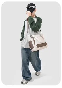 Detailed shot of casual canvas tote bag with contrast brown trim, ideal for daily student use.