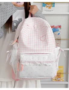 Pink plaid sweet school backpack detail showing lace trim heart embroidery and cute side pockets.