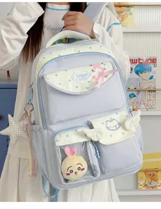 Cute Japanese ita backpack with transparent front pocket, wings, and color-block student design.