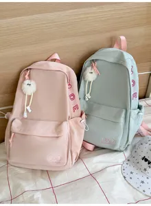 Detailed view of the Korean style solid color backpack, large capacity and lightweight design.