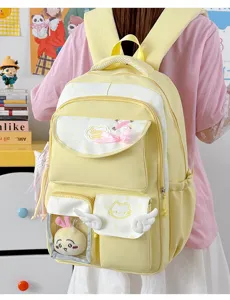 Cute Japanese style school backpack with transparent pocket, sweet wings and bow decor.