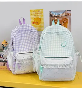 Sweet Japanese style plaid backpack with lace trim, heart embroidery, and cute pastel colors.