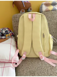 Korean style solid color backpack with pink straps, casual travel daily school bag for women.