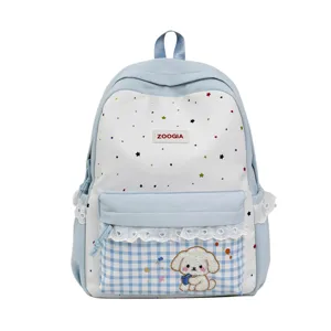 Lindo mochila escolar azul y blanca con estampado de estrellas y bordado de perrito tierno.
