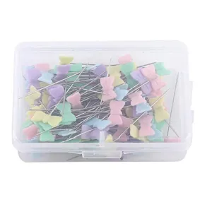 Colorful bow head pins set in a clear box, perfect for sewing, quilting and crafting projects.