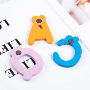 Wooden magnetic alphabet letters for fridge and early education, colorful kids learning toys.